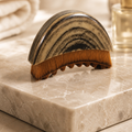 Sacred Glow Radiance Ritual Facial Brush for gentle facial massage, lymphatic drainage and skincare application.